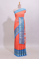 Orange color circle motifs linen cotton saree with contrast border and matching blouse