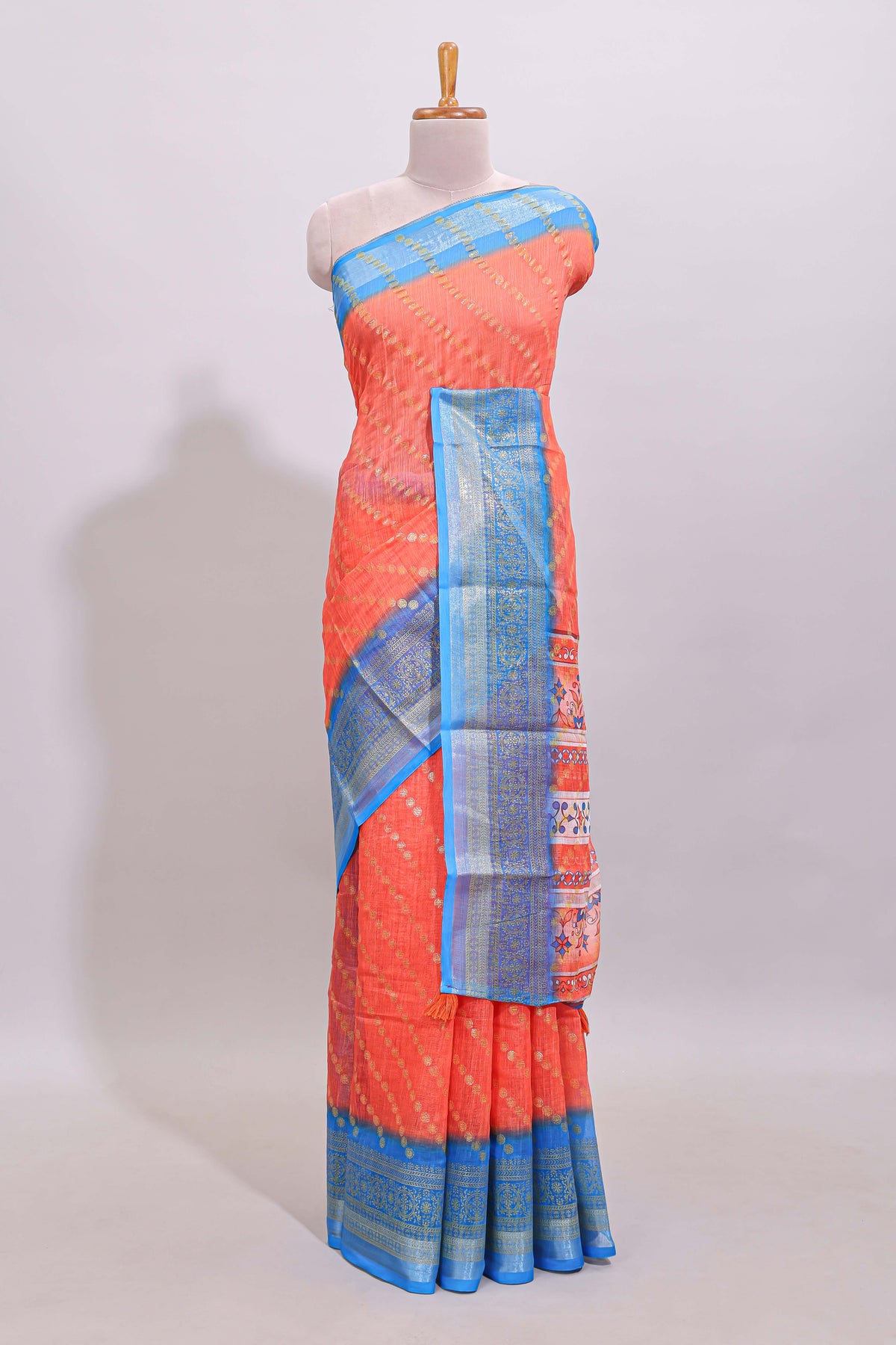 Orange color circle motifs linen cotton saree with contrast border and matching blouse