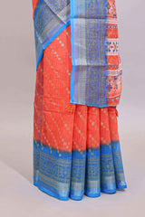 Orange color circle motifs linen cotton saree with contrast border and matching blouse