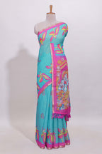 Blue stylized bird motifs linen cotton saree with contrast border and blouse