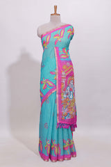 Blue stylized bird motifs linen cotton saree with contrast border and blouse
