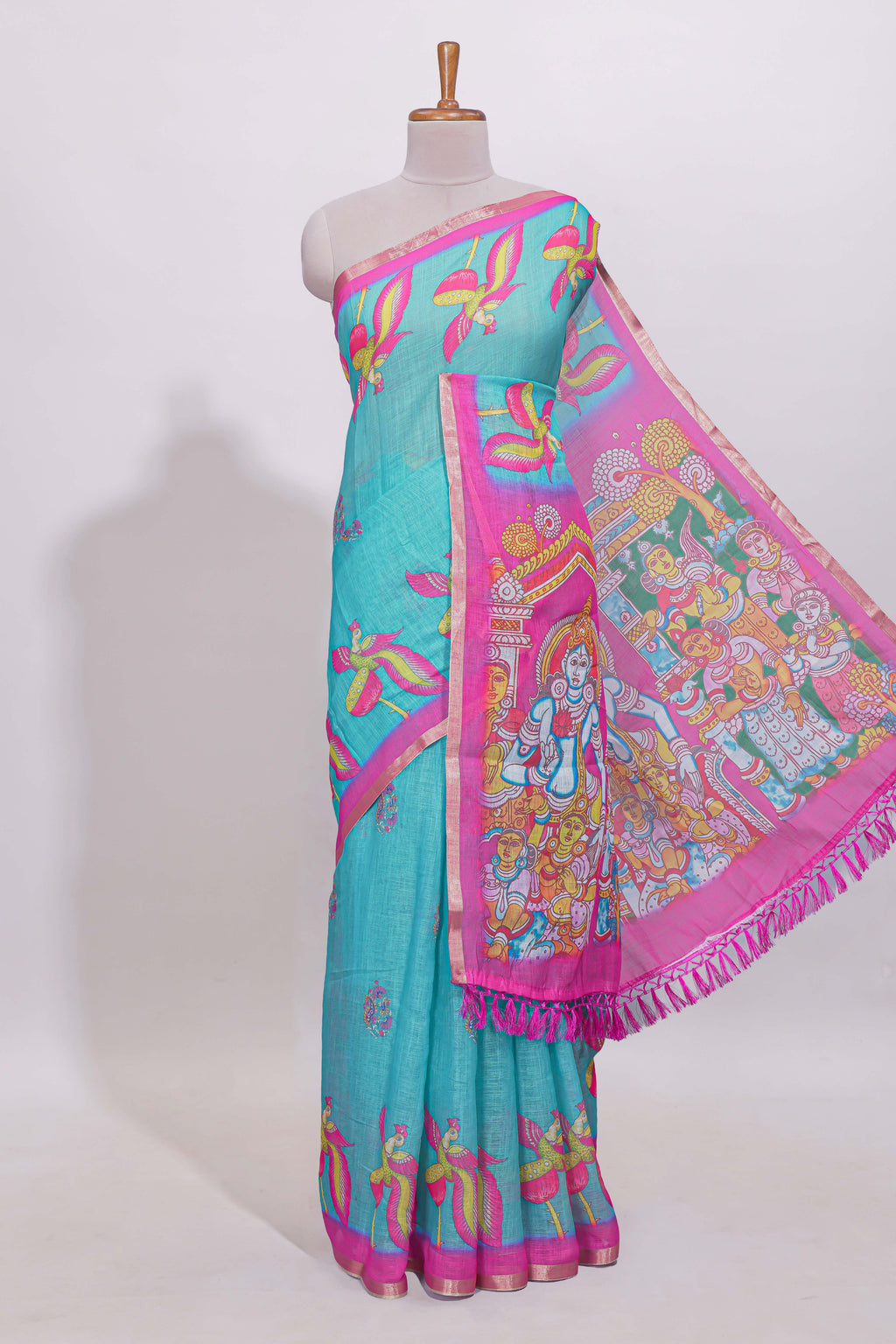 Blue stylized bird motifs linen cotton saree with contrast border and blouse