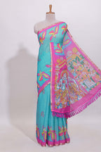 Blue stylized bird motifs linen cotton saree with contrast border and blouse
