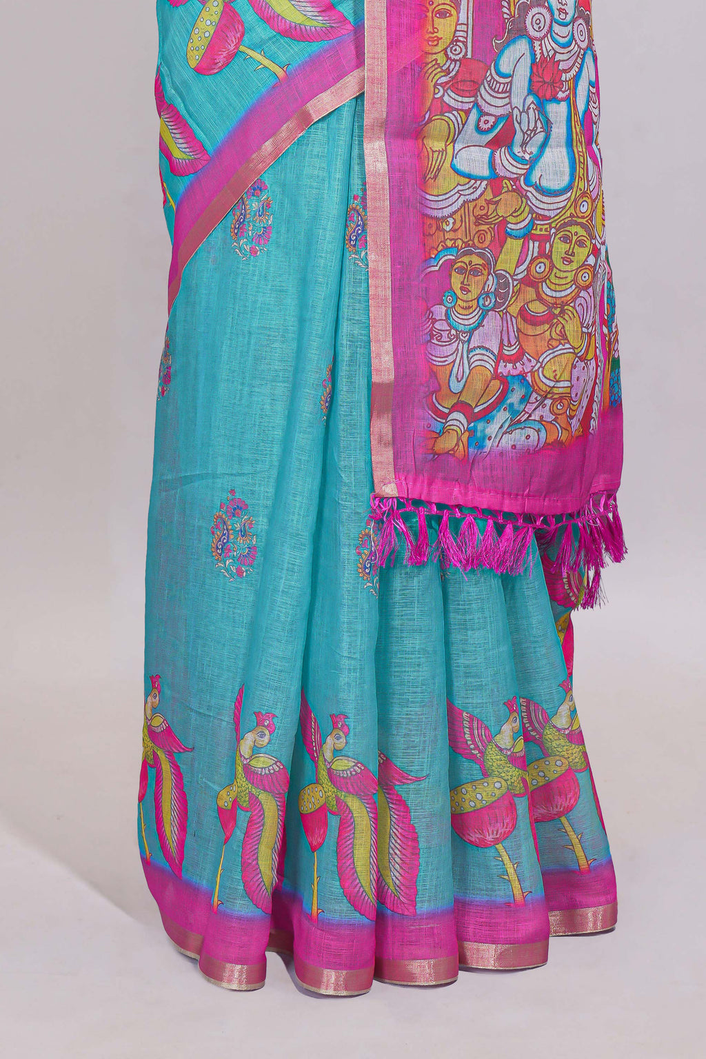 Blue stylized bird motifs linen cotton saree with contrast border and blouse
