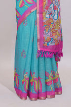 Blue stylized bird motifs linen cotton saree with contrast border and blouse