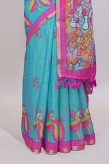 Blue stylized bird motifs linen cotton saree with contrast border and blouse