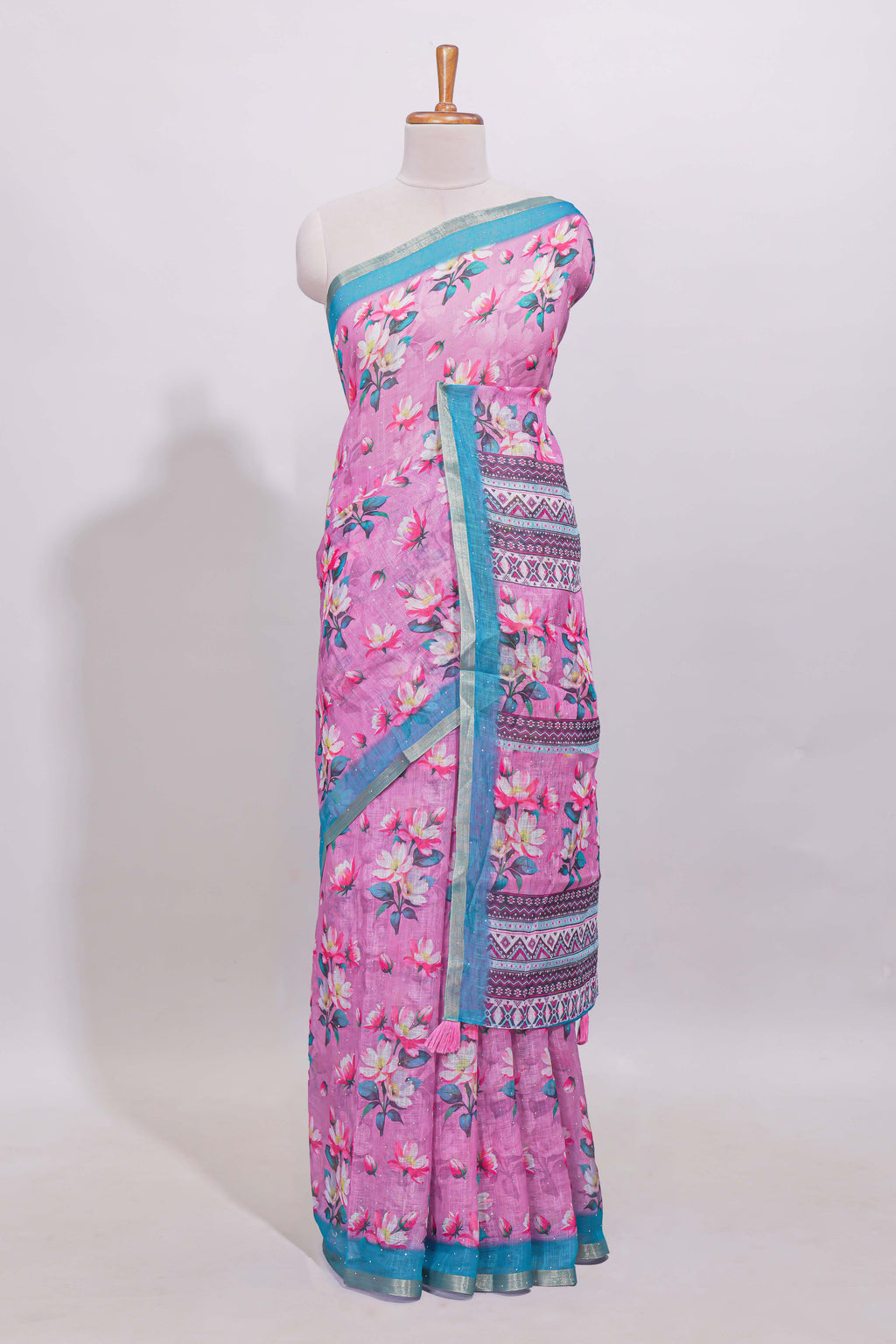 Pink floral designed linen cotton saree with contrast border and matching blouse