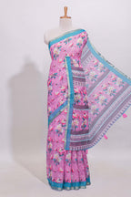 Pink floral designed linen cotton saree with contrast border and matching blouse