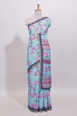 Blue floral designed linen cotton saree with contrast border and matching blouse