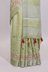 Pastel green floral designed linen cotton saree with self border and matching blouse