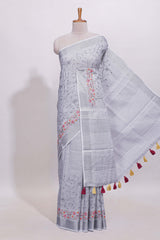 Grey floral designed linen cotton saree with self border and matching blouse