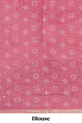 White bandhini designed linen cotton saree with self border and contrast blouse