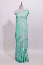 Mint green butta designed linen cotton saree with self zari border and matching blouse