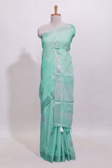 Mint green butta designed linen cotton saree with self zari border and matching blouse