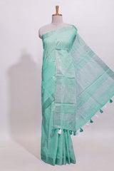 Mint green butta designed linen cotton saree with self zari border and matching blouse
