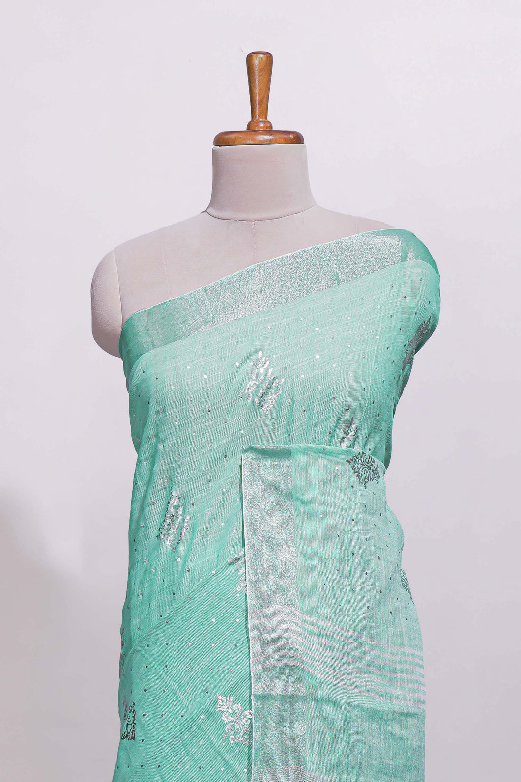 Mint green butta designed linen cotton saree with self zari border and matching blouse