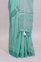 Mint green butta designed linen cotton saree with self zari border and matching blouse