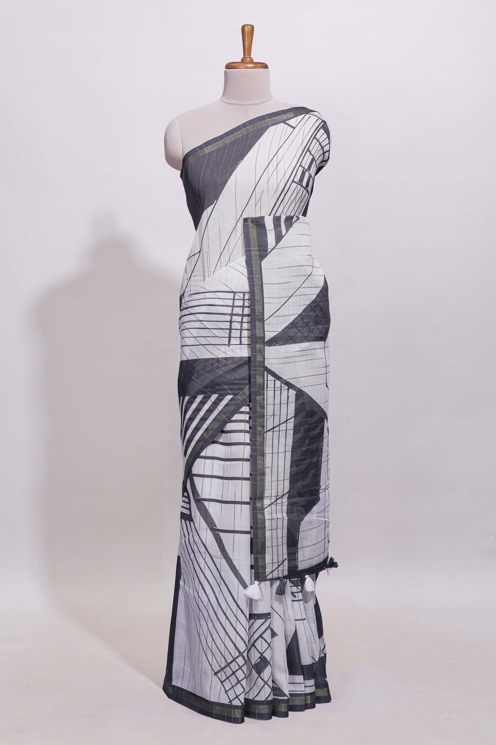 White geometric designed linen cotton saree with contrast border and blouse