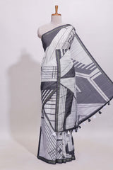 White geometric designed linen cotton saree with contrast border and blouse