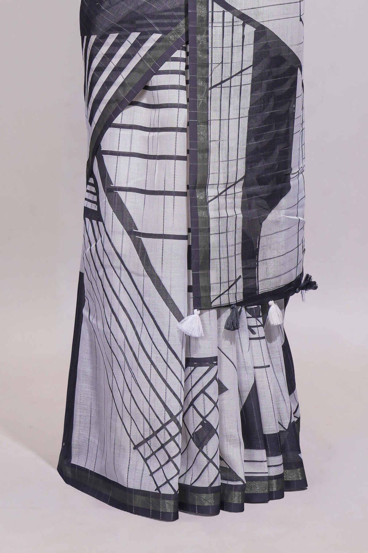 White geometric designed linen cotton saree with contrast border and blouse