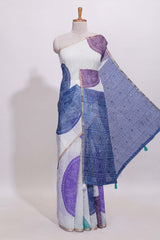 White bandhini designed linen cotton saree with self border and contrast blue blouse