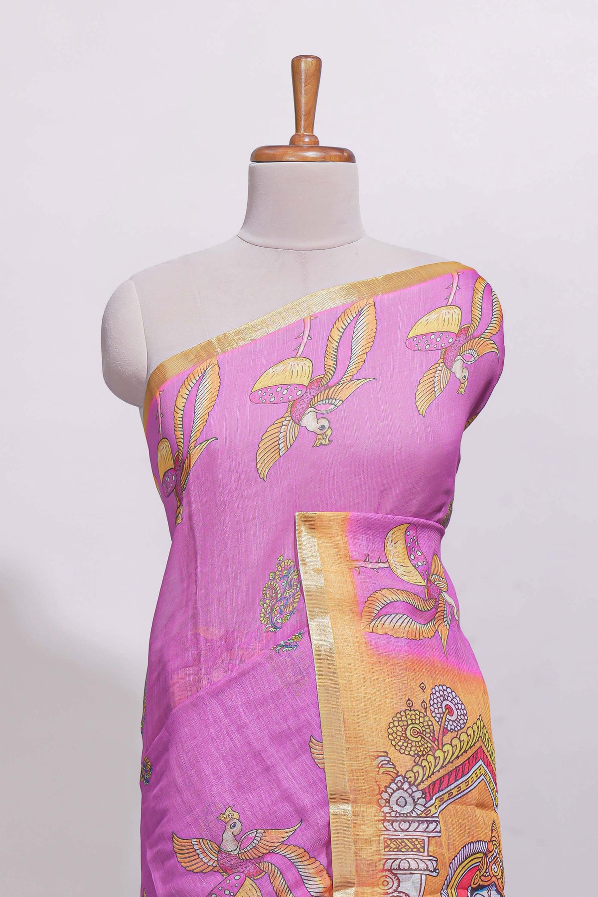 Pink stylized bird motifs linen cotton saree with contrast border and blouse