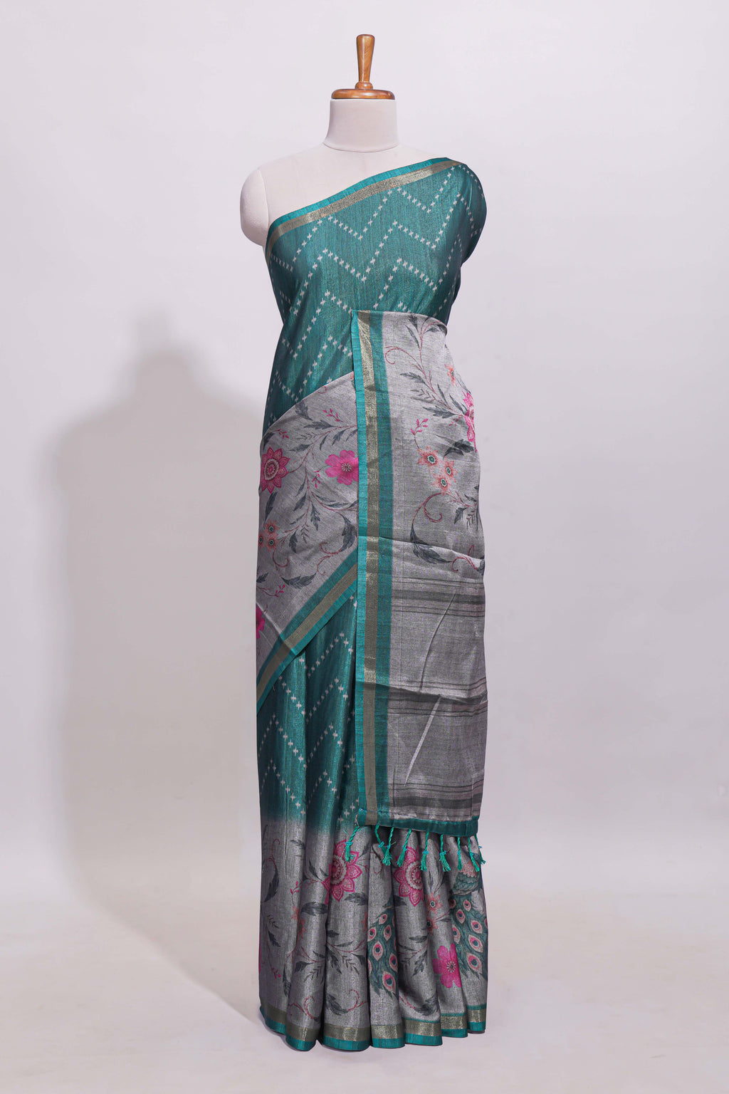 Teal green geometric designed linen cotton saree with contrast border and blouse