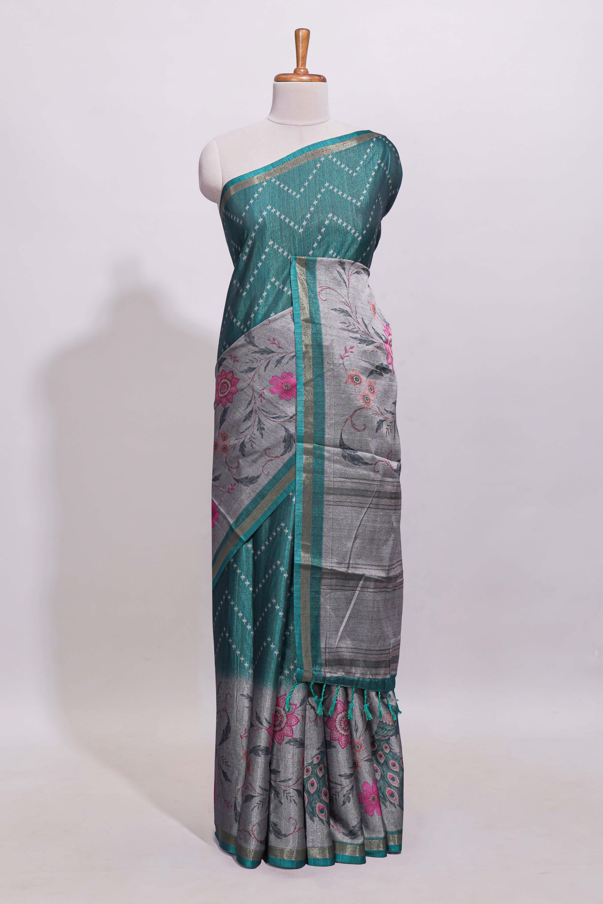 Teal green geometric designed linen cotton saree with contrast border and blouse