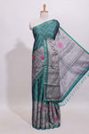 Teal green geometric designed linen cotton saree with contrast border and blouse