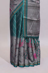 Teal green geometric designed linen cotton saree with contrast border and blouse