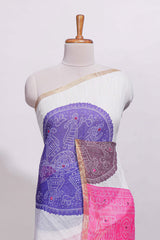 White bandhini designed linen cotton saree with self border and contrast pink blouse