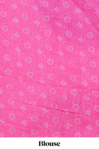 White bandhini designed linen cotton saree with self border and contrast pink blouse