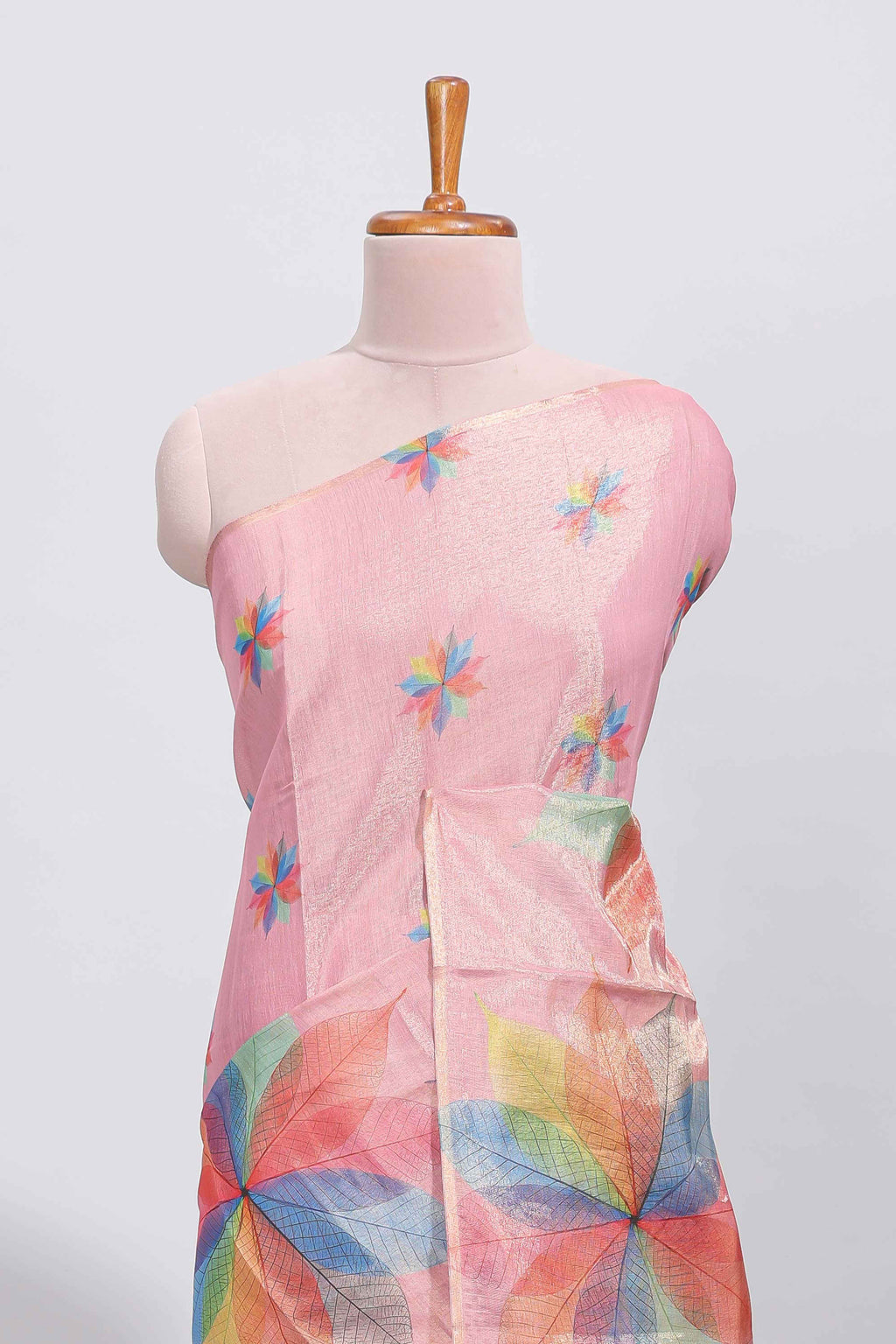 Peach floral design motifs linen cotton saree with self zari border and matching printed blouse