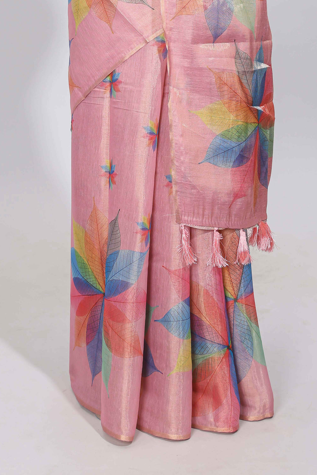 Peach floral design motifs linen cotton saree with self zari border and matching printed blouse
