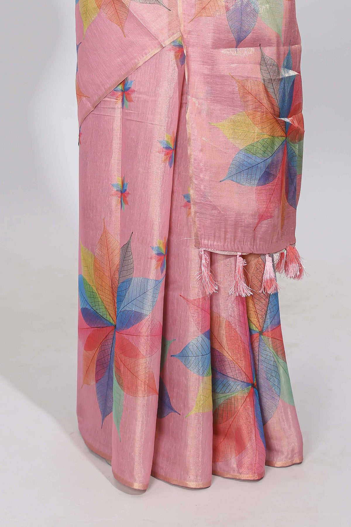 Peach floral design motifs linen cotton saree with self zari border and matching printed blouse