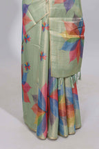 Green floral design motifs linen cotton saree with self zari border and matching printed blouse