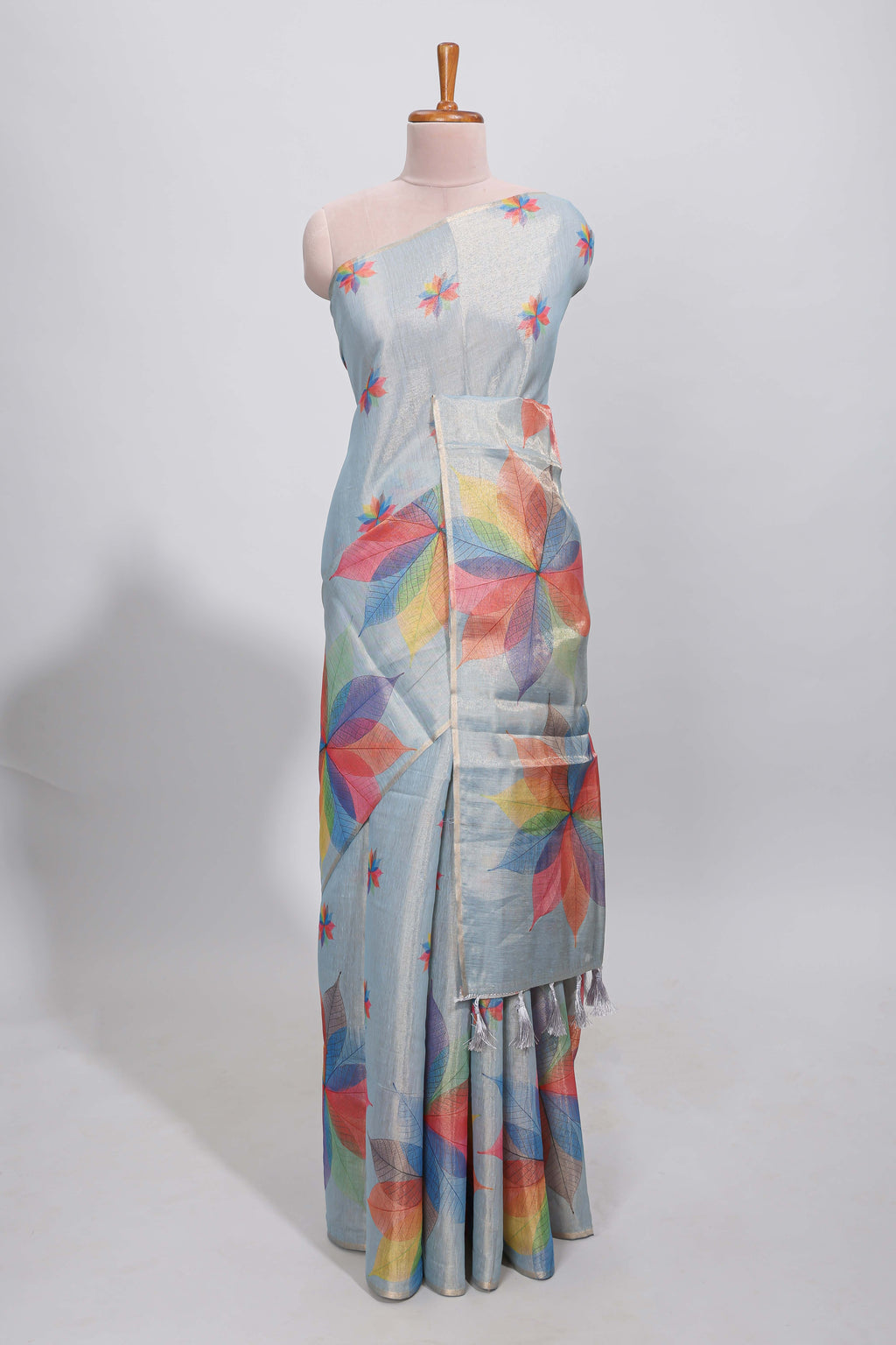 Blue floral design motifs linen cotton saree with self zari border and matching printed blouse
