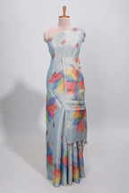 Blue floral design motifs linen cotton saree with self zari border and matching printed blouse