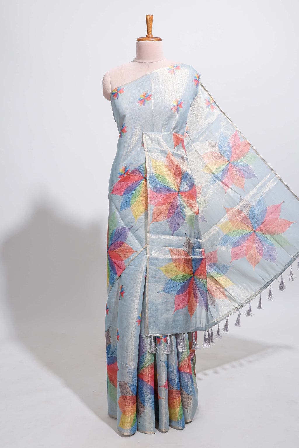 Blue floral design motifs linen cotton saree with self zari border and matching printed blouse