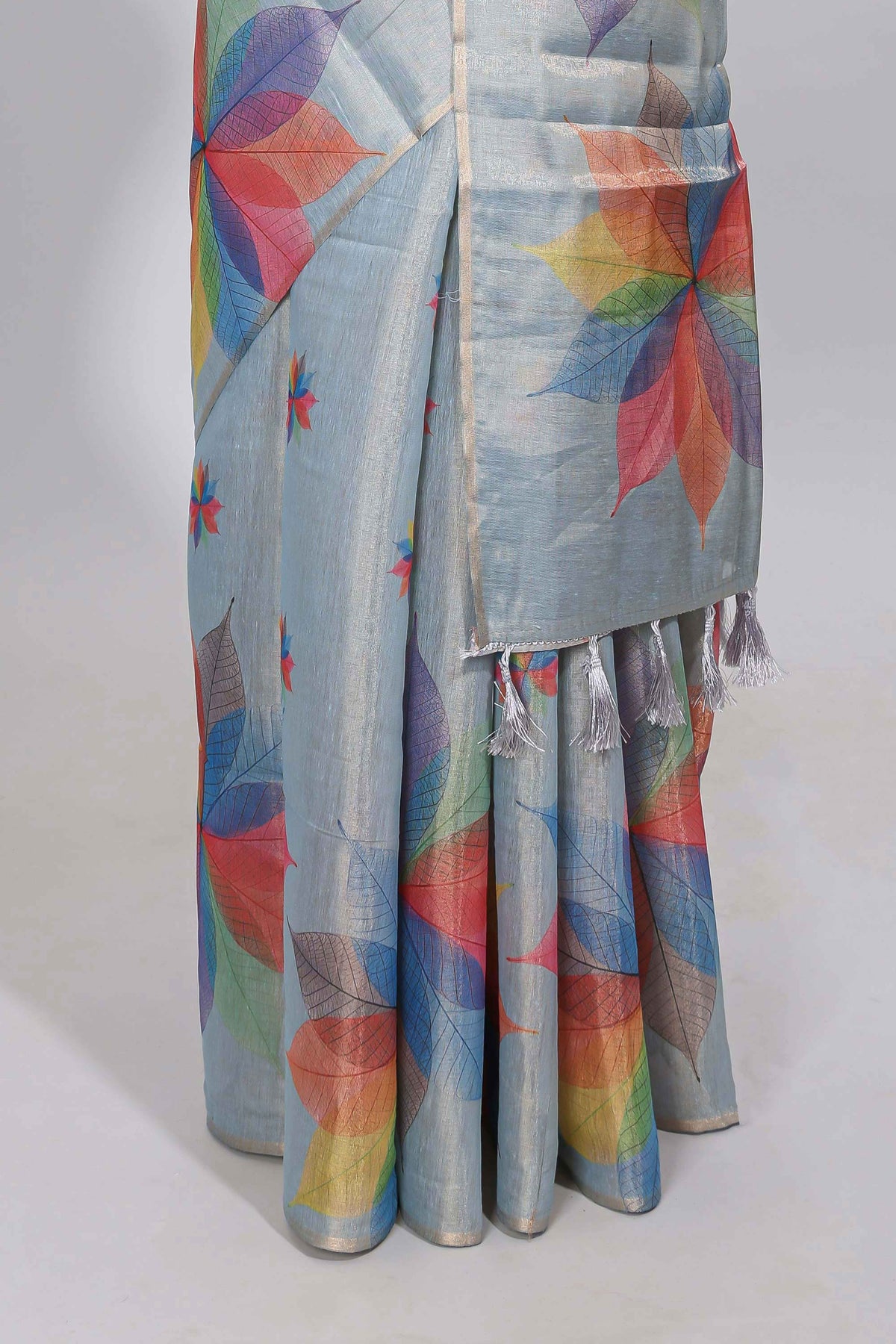 Blue floral design motifs linen cotton saree with self zari border and matching printed blouse
