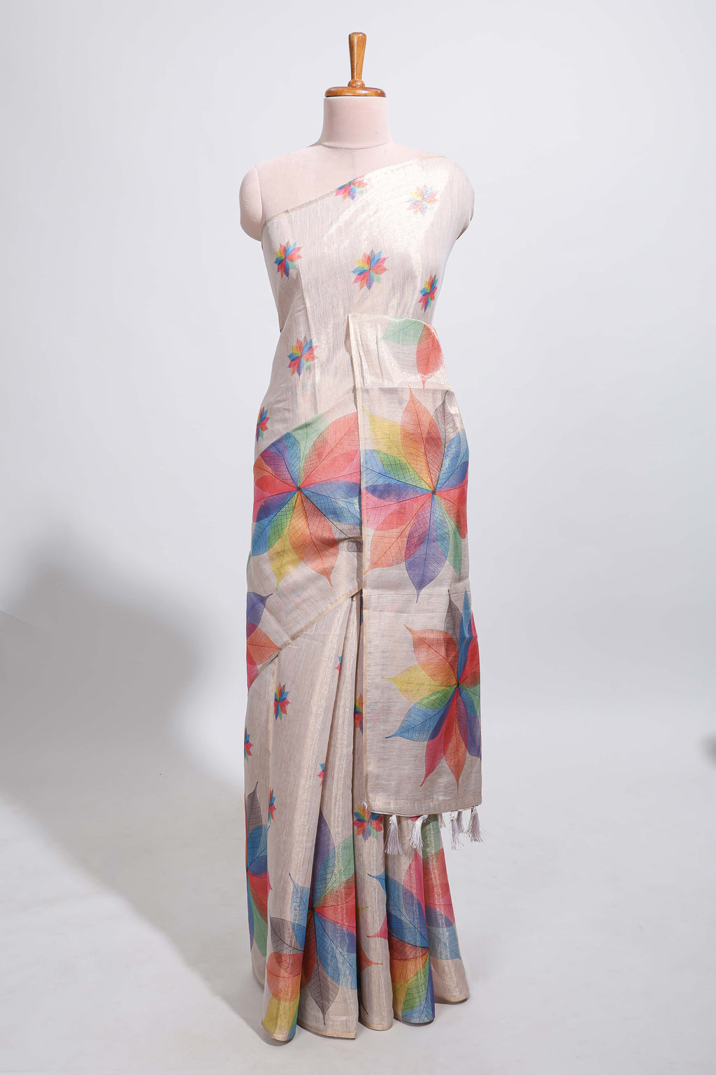 Beige floral design motifs linen cotton saree with self zari border and matching printed blouse
