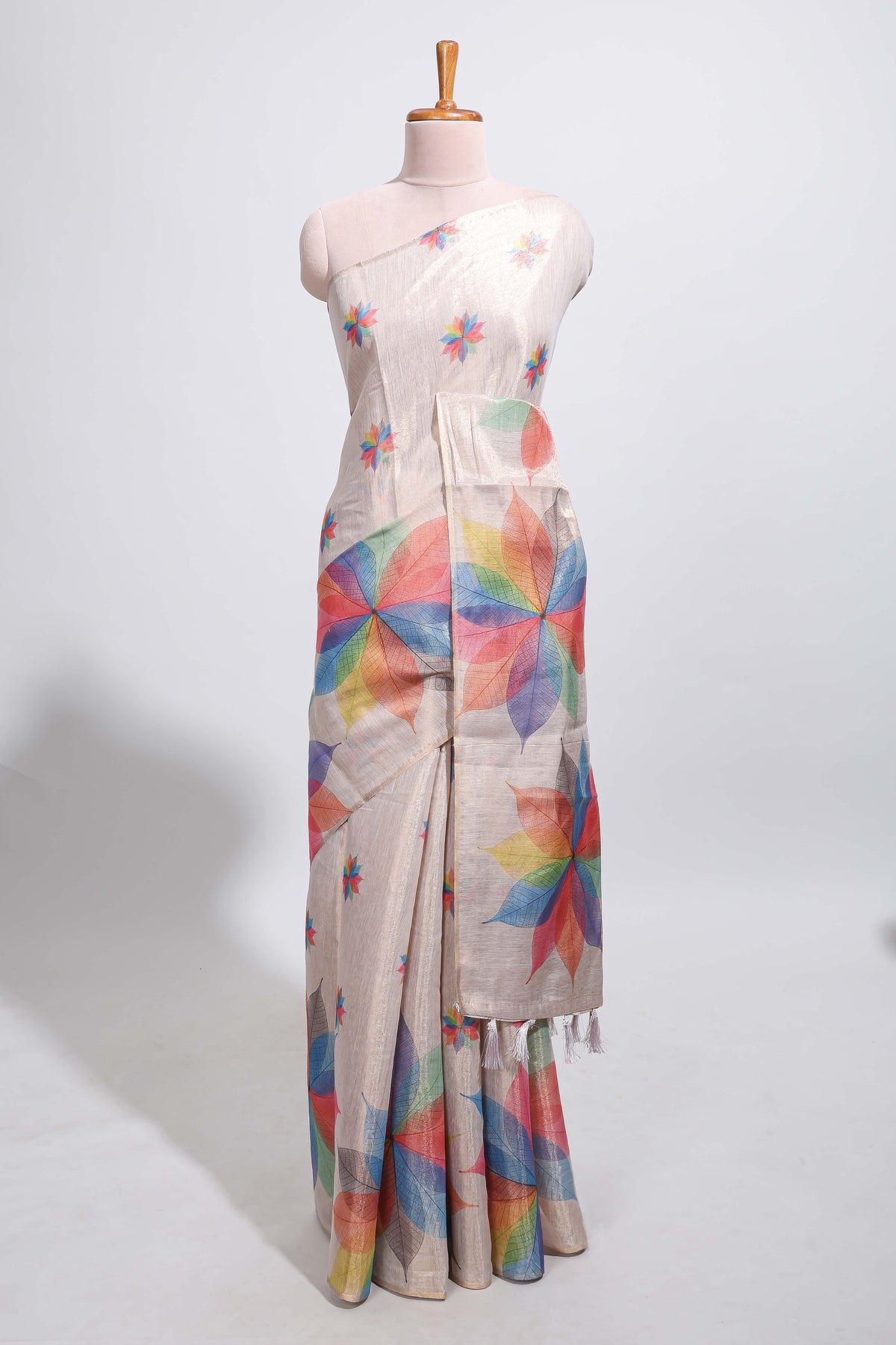 Beige floral design motifs linen cotton saree with self zari border and matching printed blouse