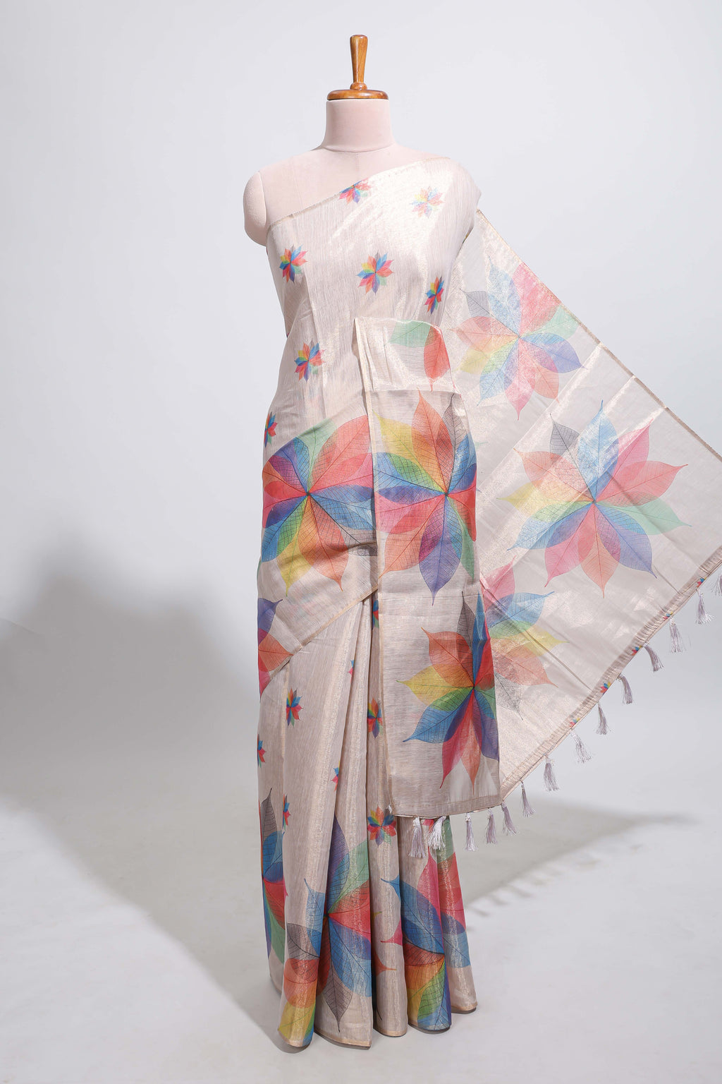 Beige floral design motifs linen cotton saree with self zari border and matching printed blouse