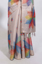 Beige floral design motifs linen cotton saree with self zari border and matching printed blouse