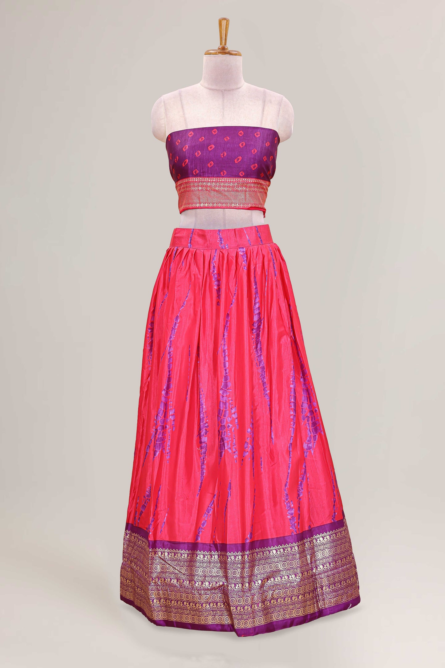 Pink dola silk bandhani designer lehenga with contrast blouse and dhavani