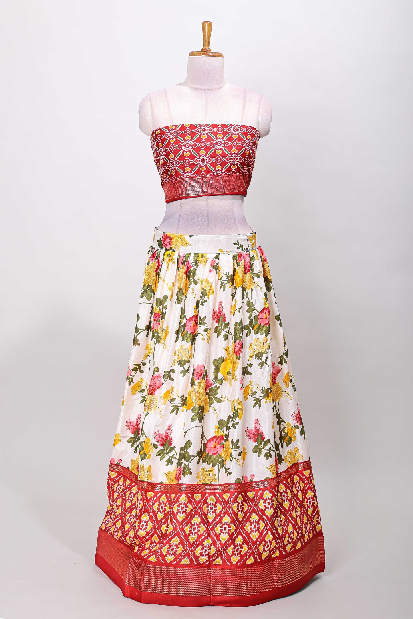 White dola silk floral lehenga with maroon pochampalli border and floral butta dhavani