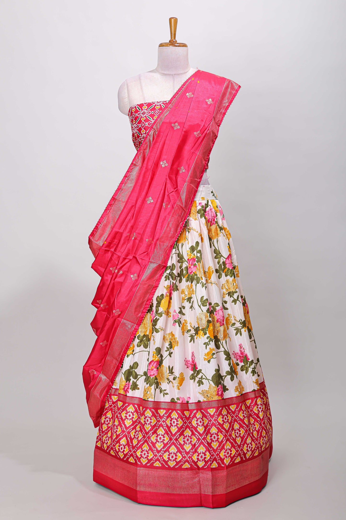 White dola silk floral lehenga with pink pochampalli border and floral butta dhavani