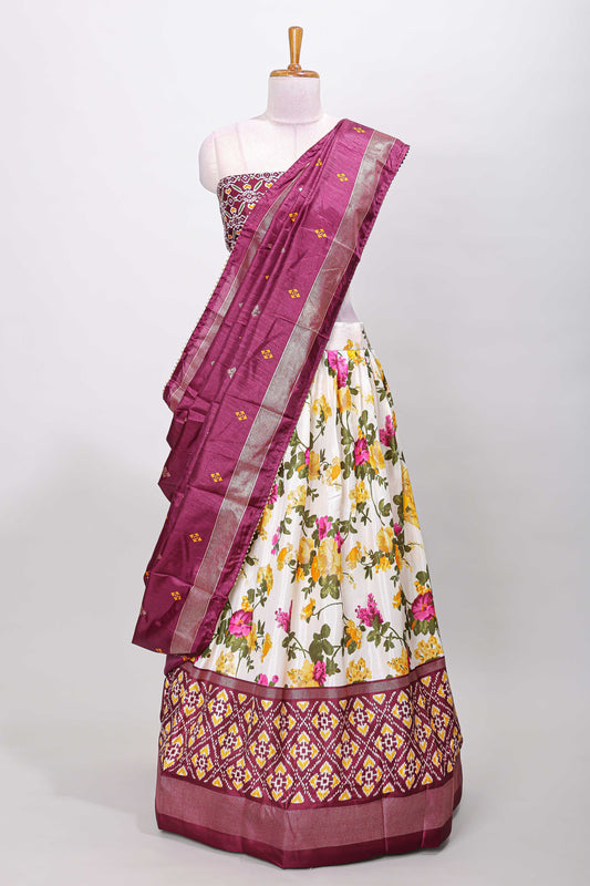 White dola silk floral lehenga with purple pochampalli border and floral butta dhavani