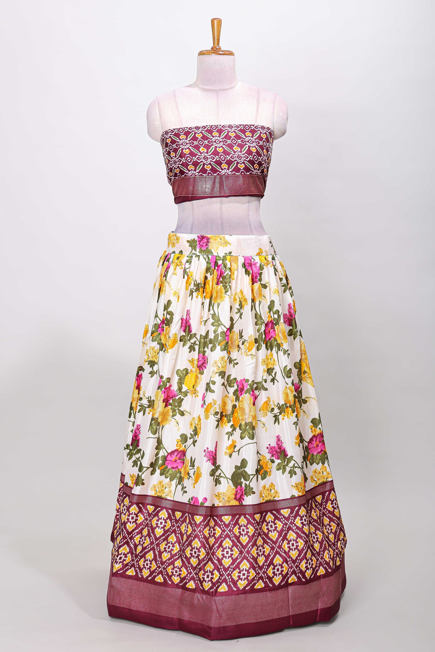 White dola silk floral lehenga with purple pochampalli border and floral butta dhavani