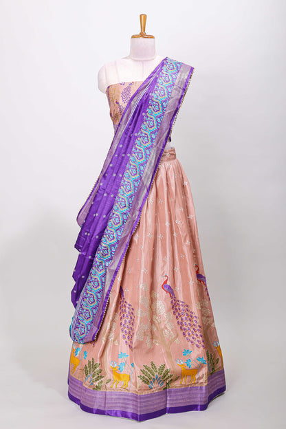 Peach dola silk peacock and floral printed lehenga with contrast border and dhavani